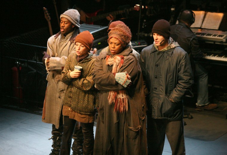In this image released by Sony Pictures' Releasing,  cast members  of the Broadway musical \"Rent\", Marcus Paul James, Tracy McDowell, Gwen Stewart, Jay Wilkison, are shown during a filming of the performance in New York. (AP Photo/Sony Pictures' Releasing, Casey Stouffer) ** NO SALES **